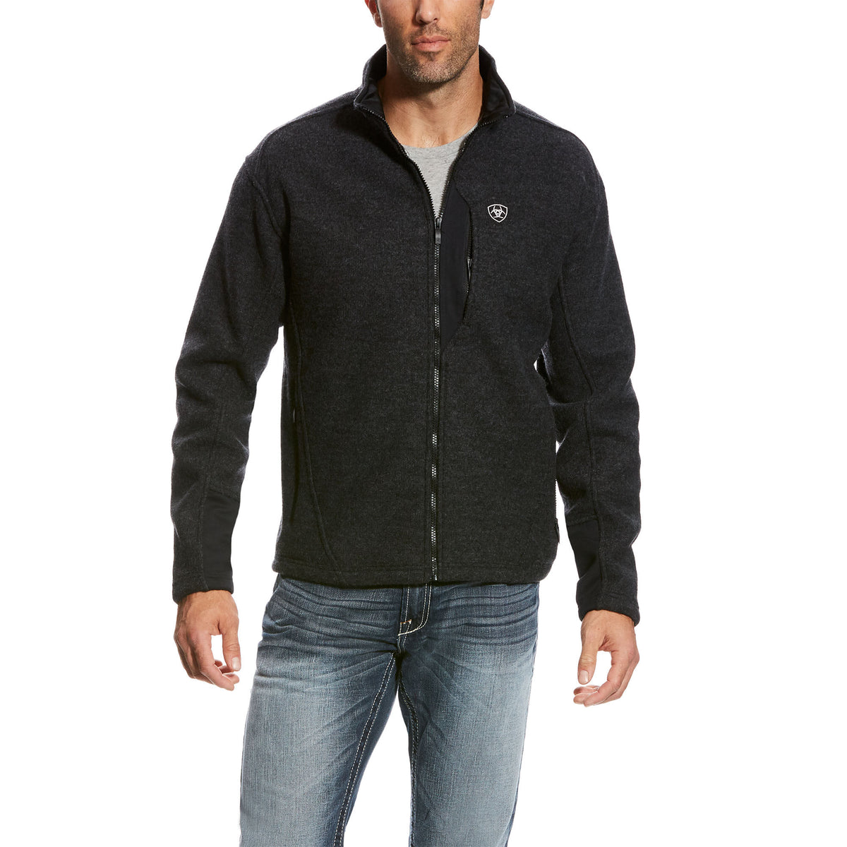 Man wearing Ariat full-zip bonded fleece jacket with stand collar and zippered pockets