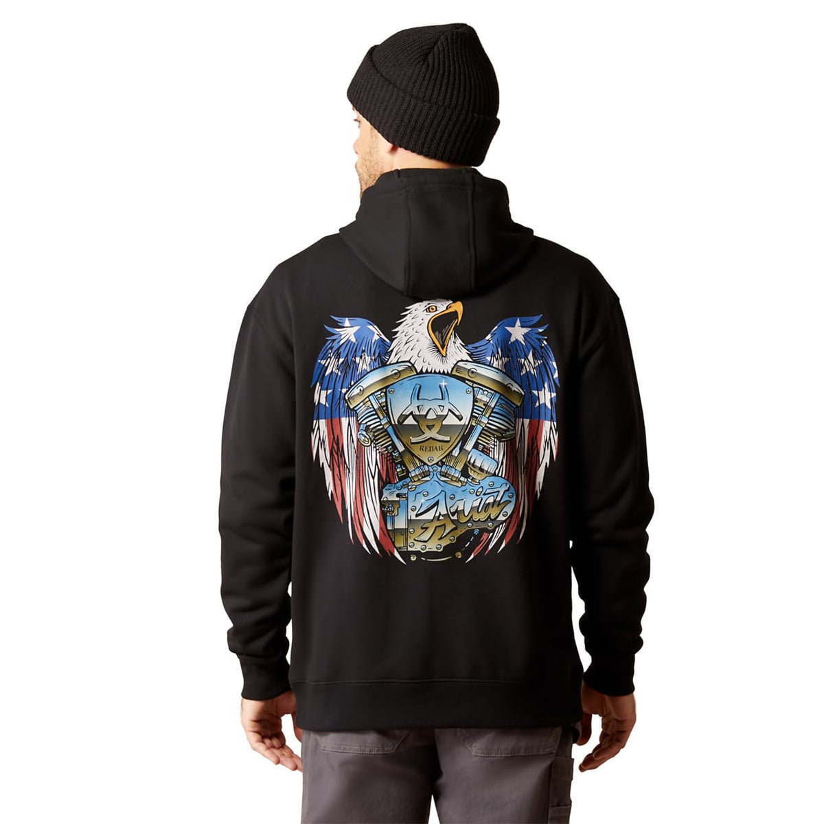 Man wearing black pullover hoodie with American eagle motorcycle engine graphic on back