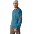 Man wearing Ariat quarter-zip pullover sweatshirt with logo sleeve graphic and chest zip pocket