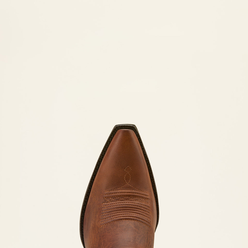Close-up top view of a pointed-toe brown leather western cowboy boot with stitching detail