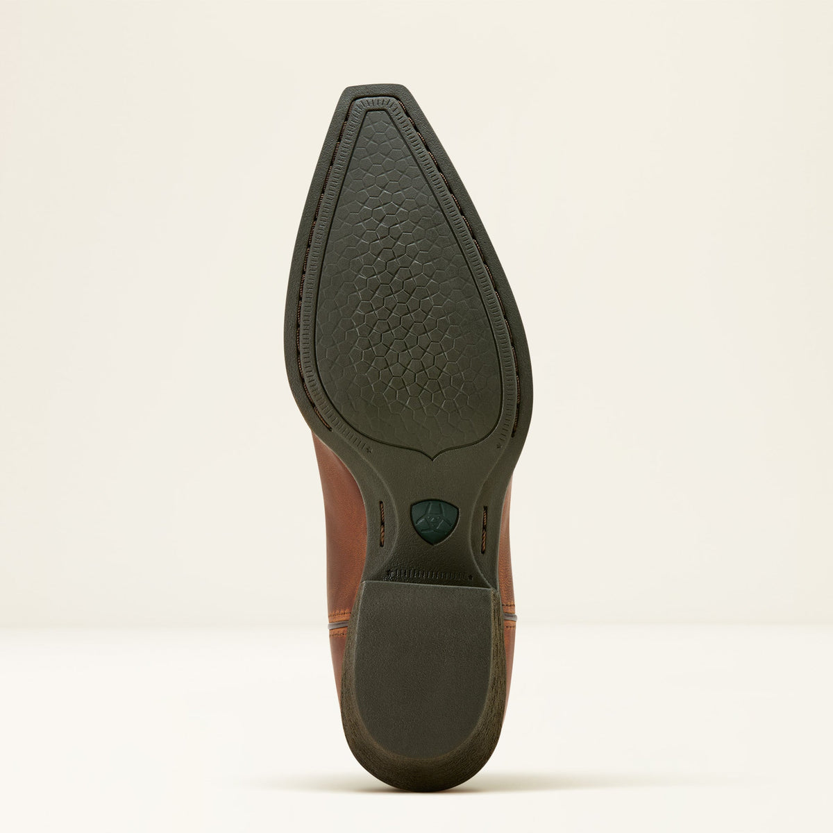 Bottom sole view of Ariat western cowboy boot with pointed toe and rubber outsole