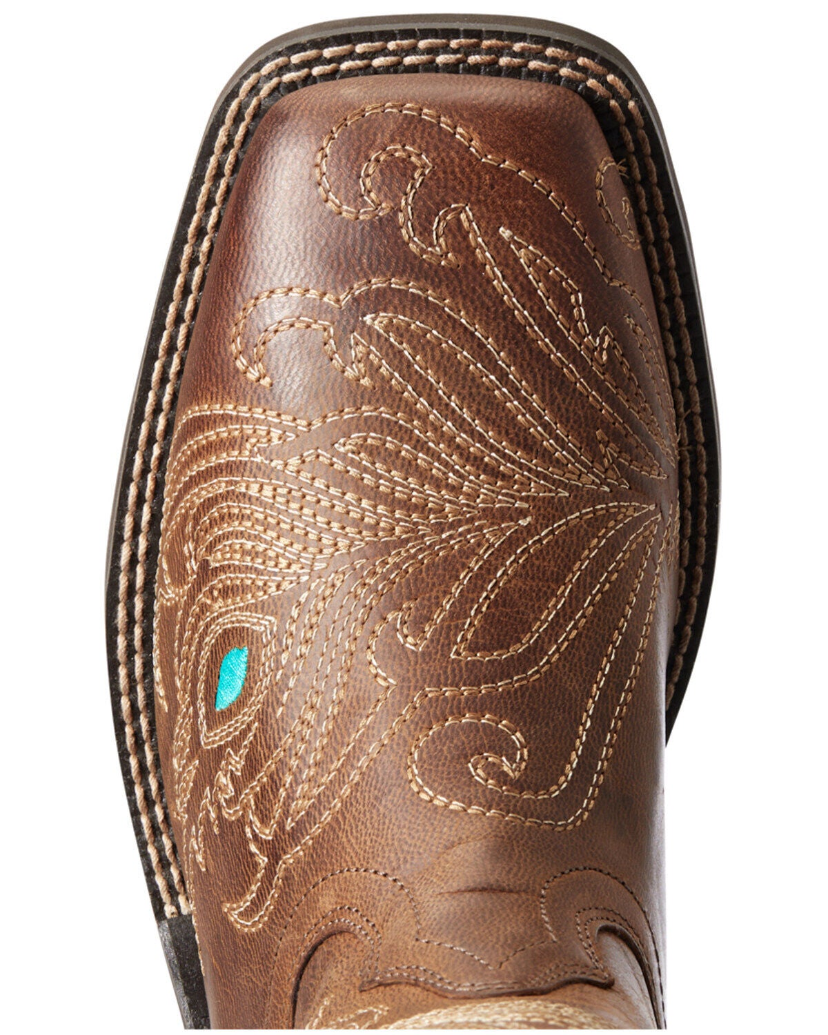 Close-up toe detail of women's western cowboy boot with intricate embroidery stitching