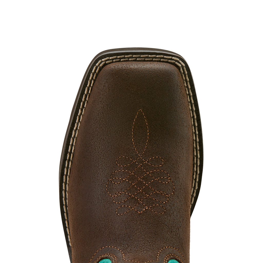 Close-up of square toe on brown leather western boot with decorative stitching
