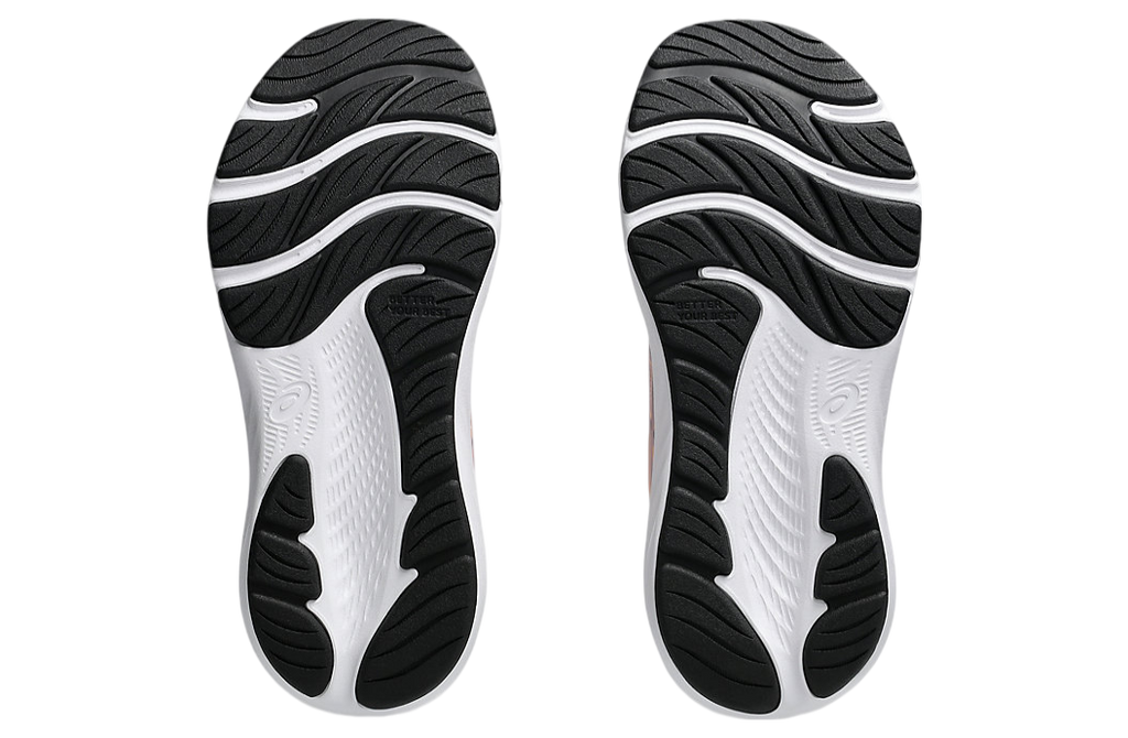 Bottom sole view of a pair of Asics girls running shoes showing outsole tread pattern