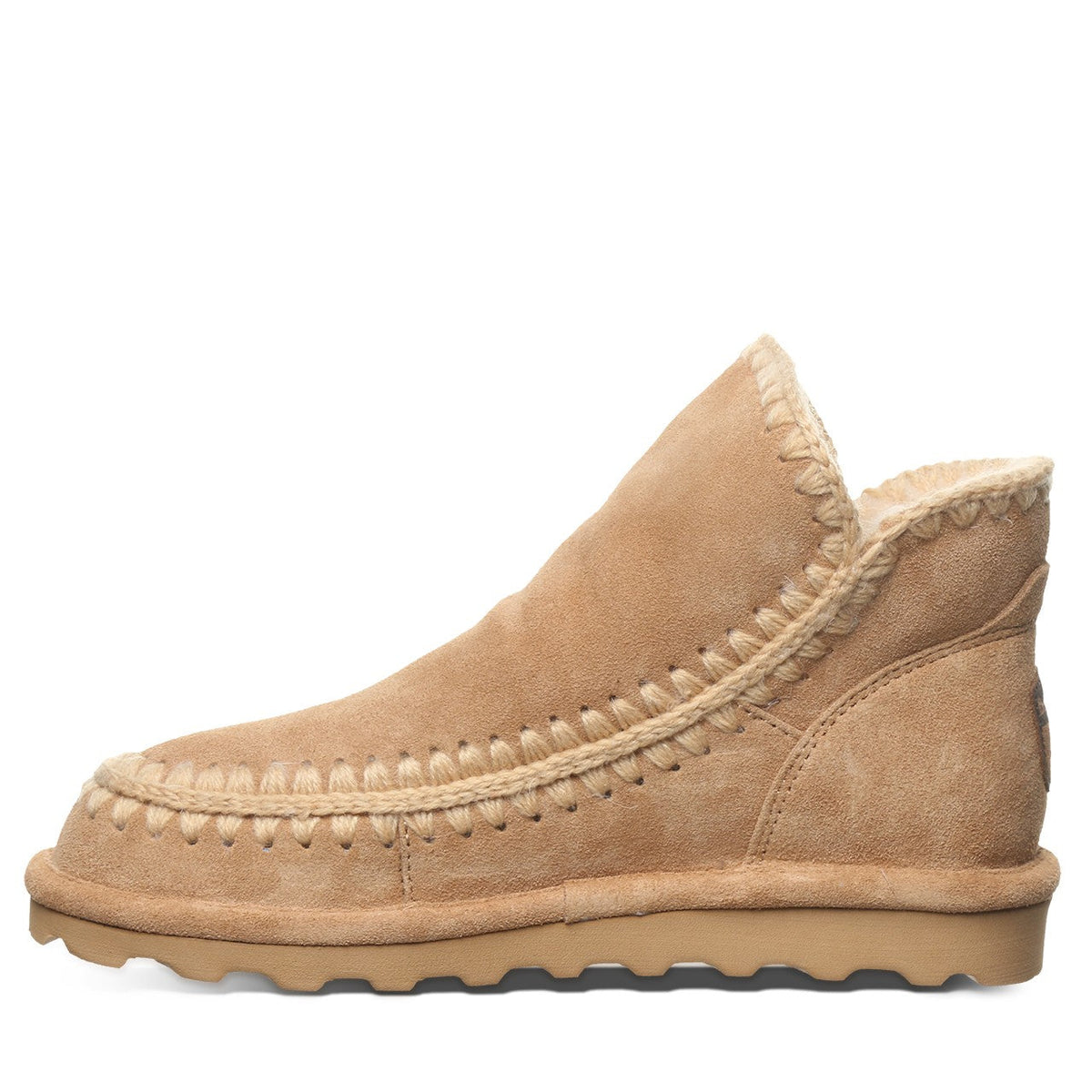 Women's suede ankle boot with whipstitch detailing, shearling lining, and rubber sole