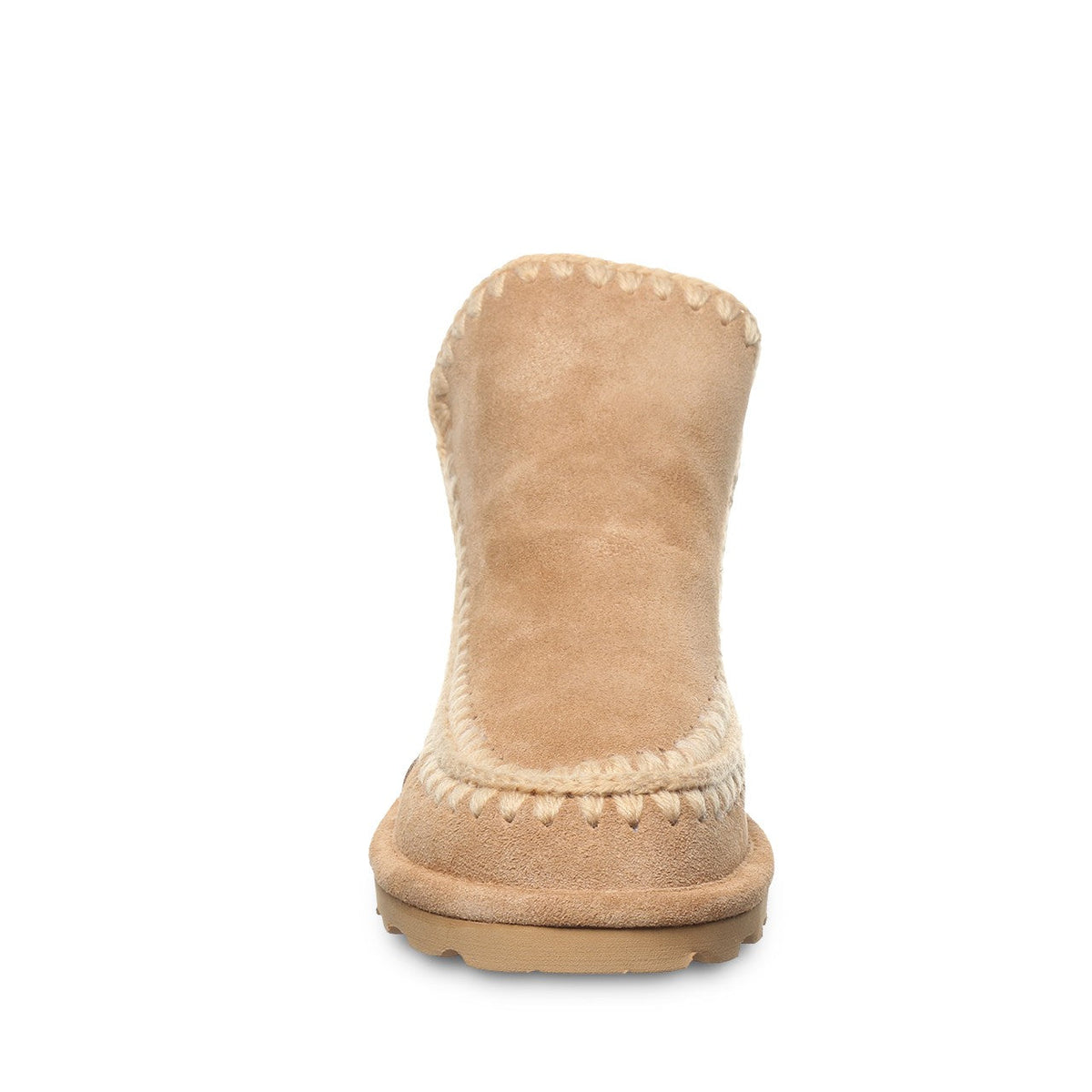 Back view of a suede ankle boot with whipstitch detailing and rubber lug sole