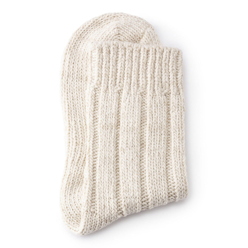 Chunky ribbed knit cotton sock folded flat, showing toe and cuff detail