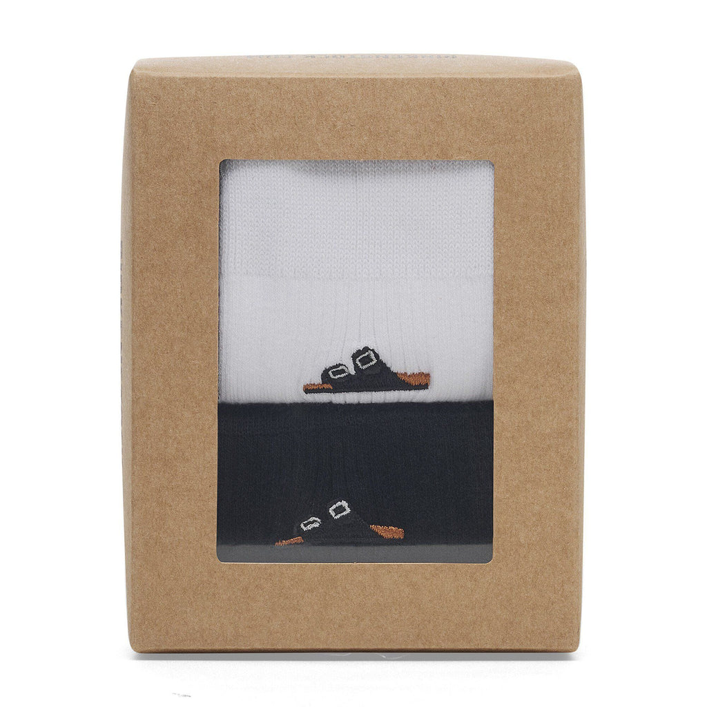 Birkenstock ribbed cotton socks in black and white displayed in kraft paper gift box