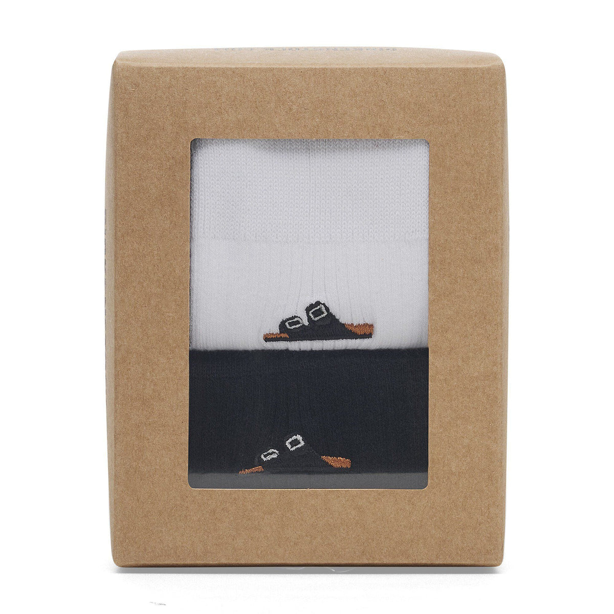 Birkenstock ribbed cotton socks in black and white displayed in kraft paper gift box