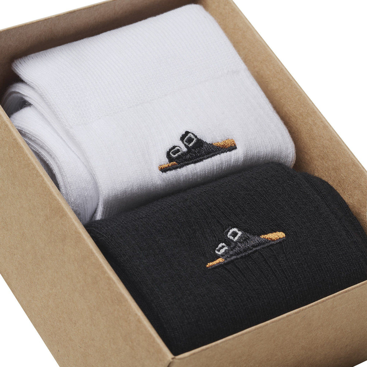 Birkenstock ribbed cotton socks in black and white displayed in kraft gift box