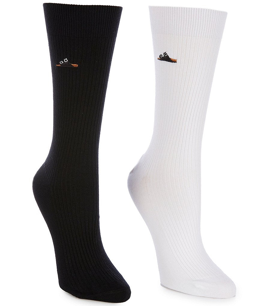 Pair of ribbed crew socks, one black and one white, with small embroidered logo detail