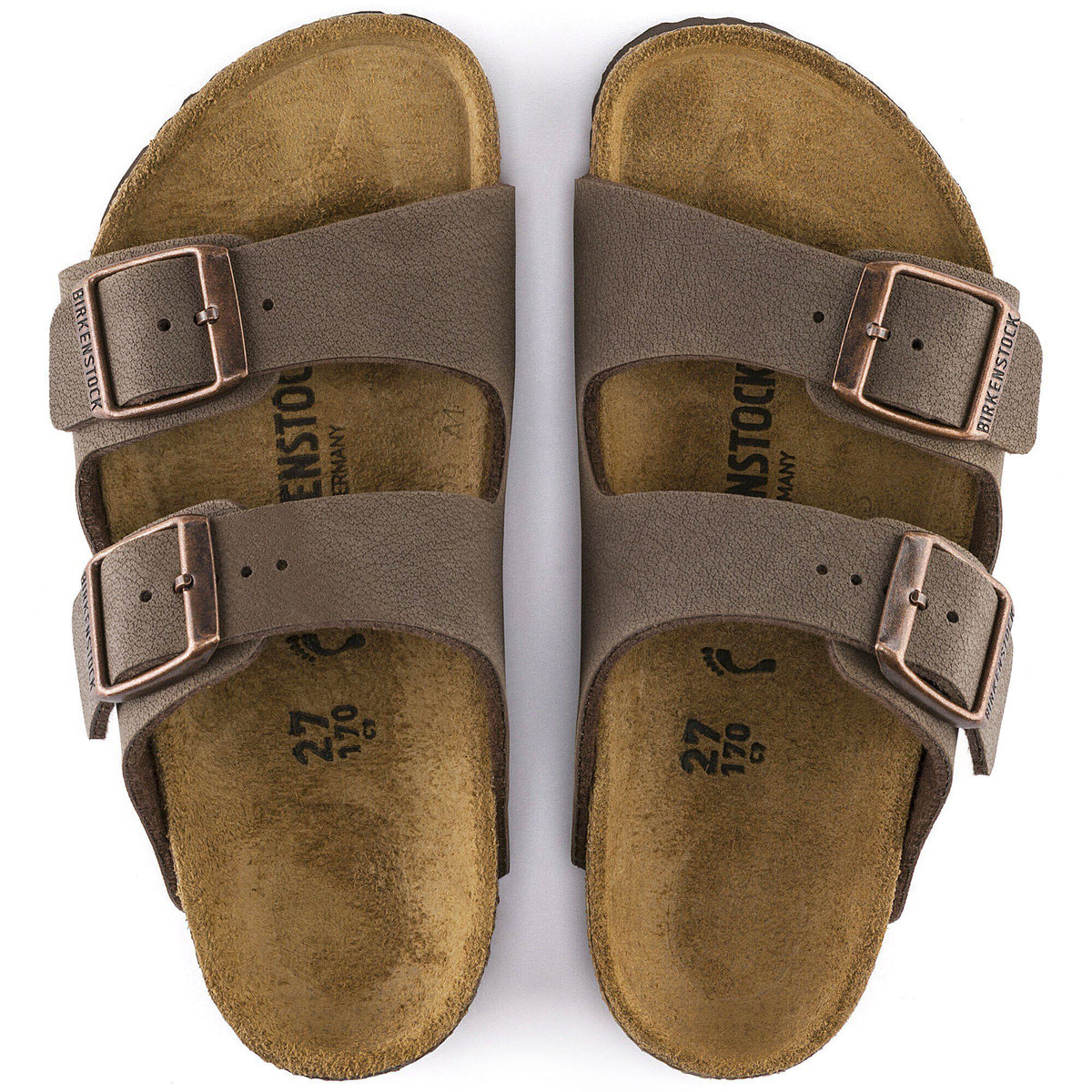 Top-down view of a pair of Birkenstock Arizona two-strap sandals with copper buckles