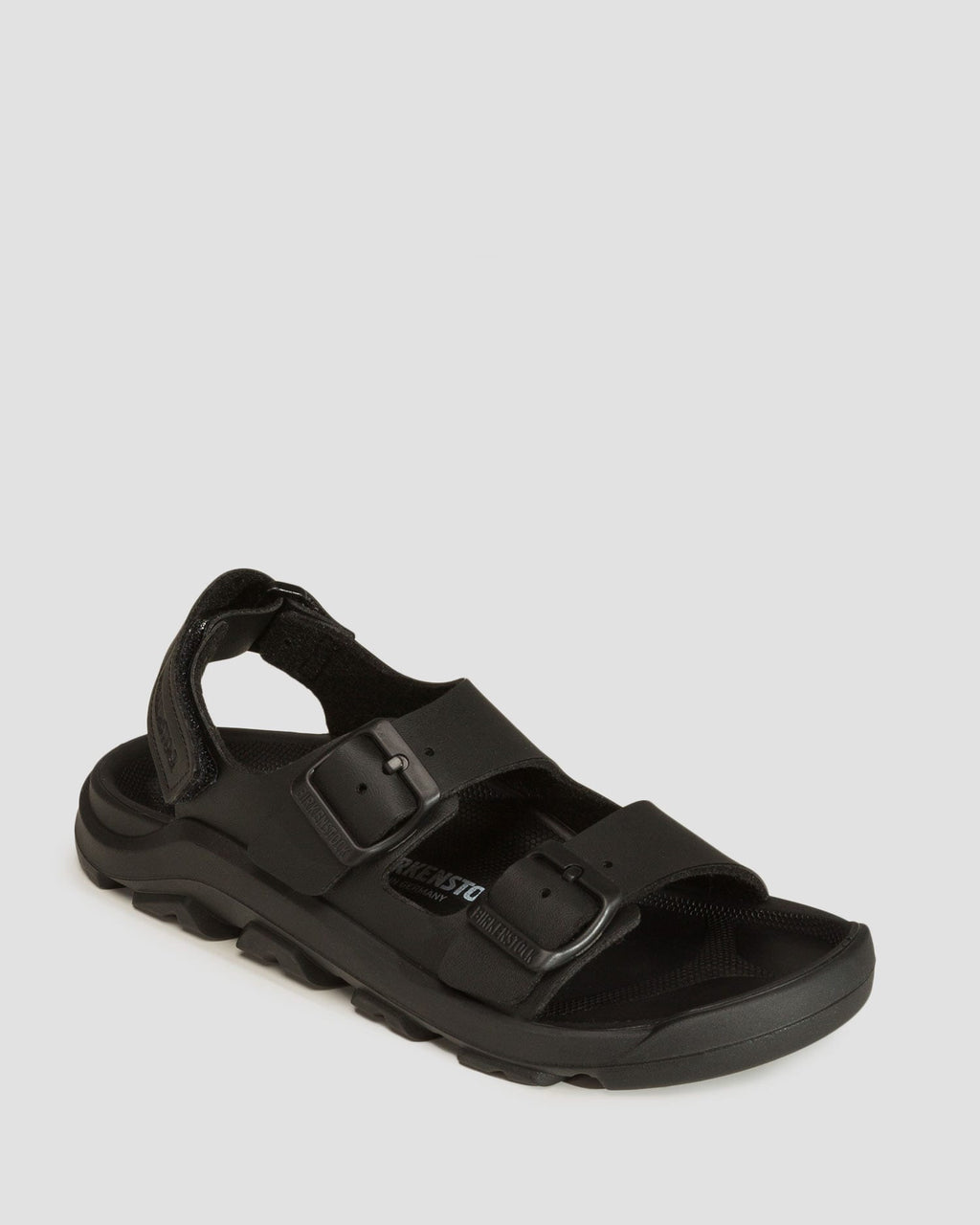 Birkenstock kids sandal with two adjustable buckle straps and heel strap on rugged outsole