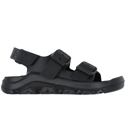 Birkenstock kids sandal with two buckle straps and rugged EVA outsole, side view