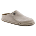 Birkenstock slip-on clog with closed toe, suede upper, and visible topstitching on natural sole
