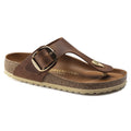 Birkenstock Gizeh thong sandal with large gold buckle and contoured cork footbed