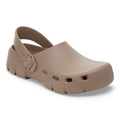 Birkenstock Birki Flow clog with buckle ankle strap and ventilation holes, angled side view