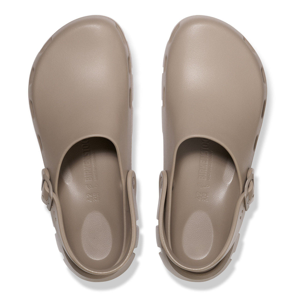 Birkenstock Birki Flow clogs in taupe, top-down view showing pair with ankle straps