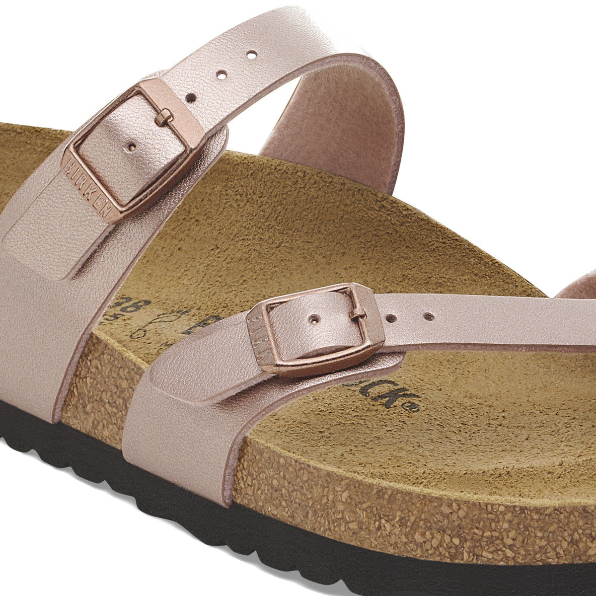 Close-up detail of Birkenstock Mayari sandal showing adjustable buckle straps and cork footbed