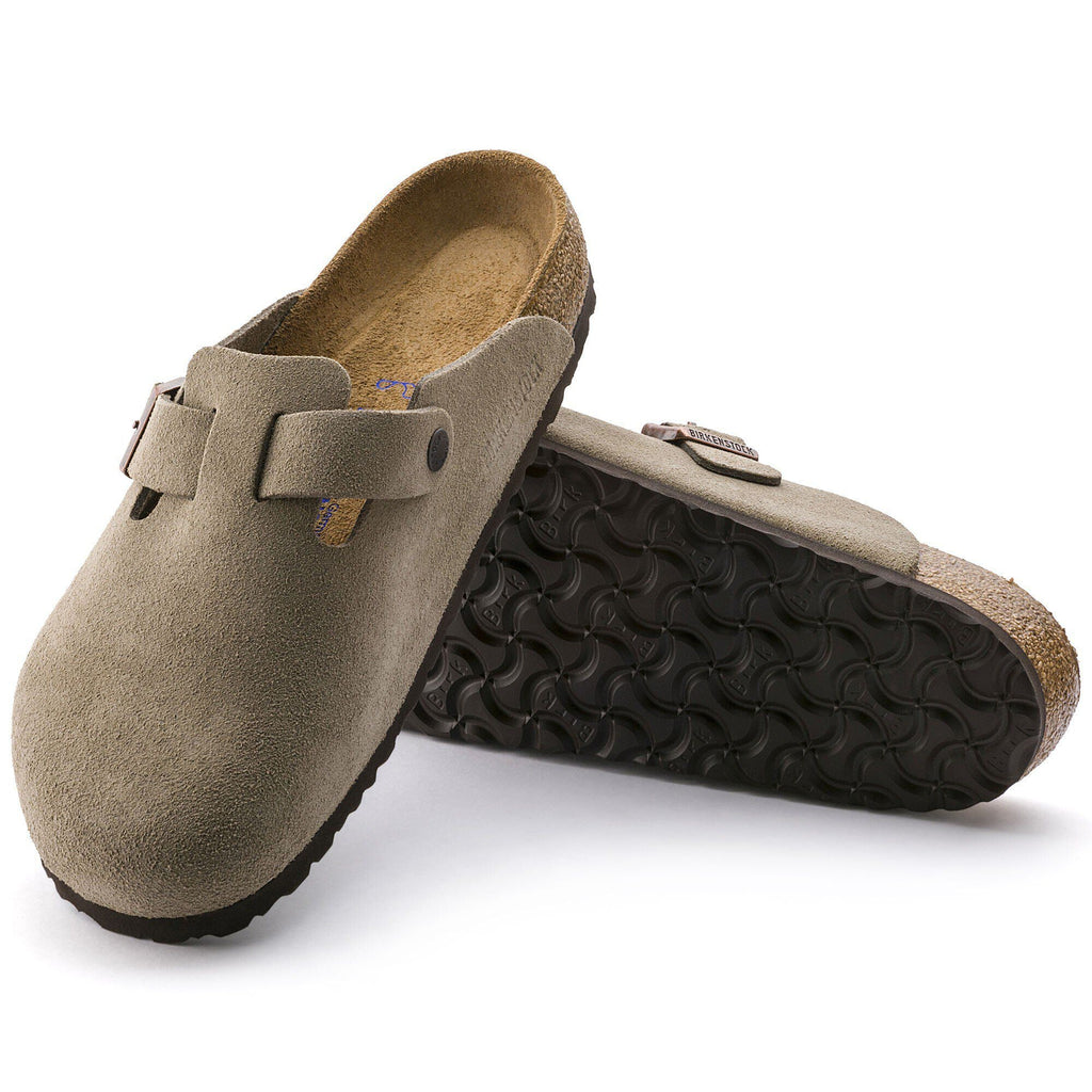 Birkenstock Boston suede clogs shown as a pair, one displaying sole tread pattern