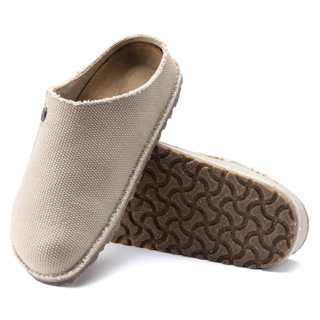 Birkenstock Zermatt canvas clogs shown from side and bottom sole angles on white background
