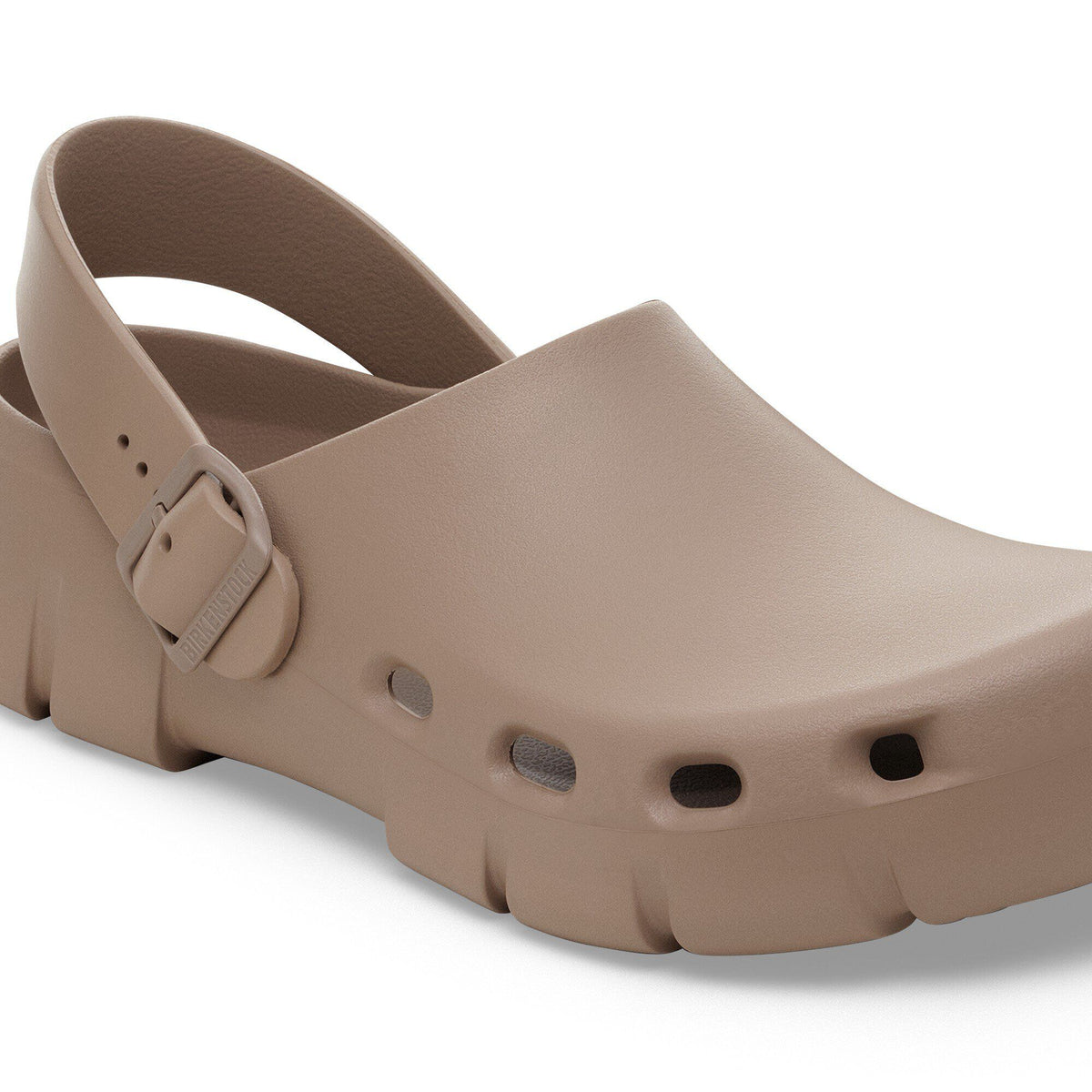 Birkenstock slingback clog with buckle strap, ventilation holes, and chunky outsole