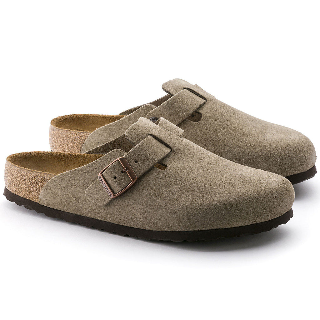 Birkenstock Boston suede clogs with adjustable buckle strap and cork footbed, shown as a pair