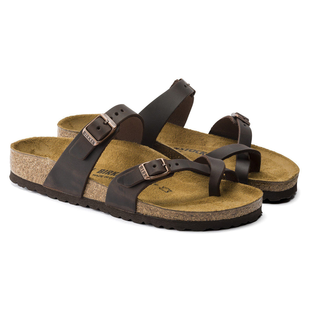 Pair of Birkenstock Mayari sandals with toe loop strap, ankle strap, and cork footbed