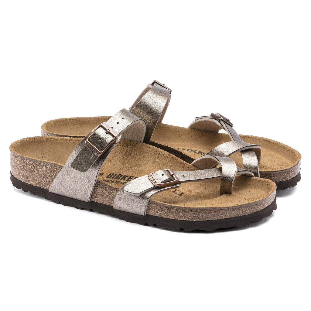 Birkenstock Mayari women's toe-loop sandals with metallic straps and cork footbed, pair angled view