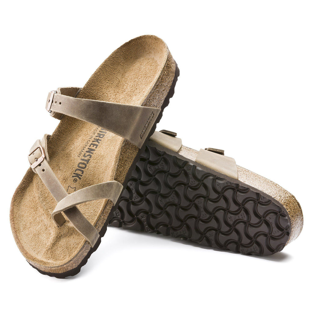 Birkenstock Mayari sandals shown as a pair, one displaying footbed and one showing outsole tread
