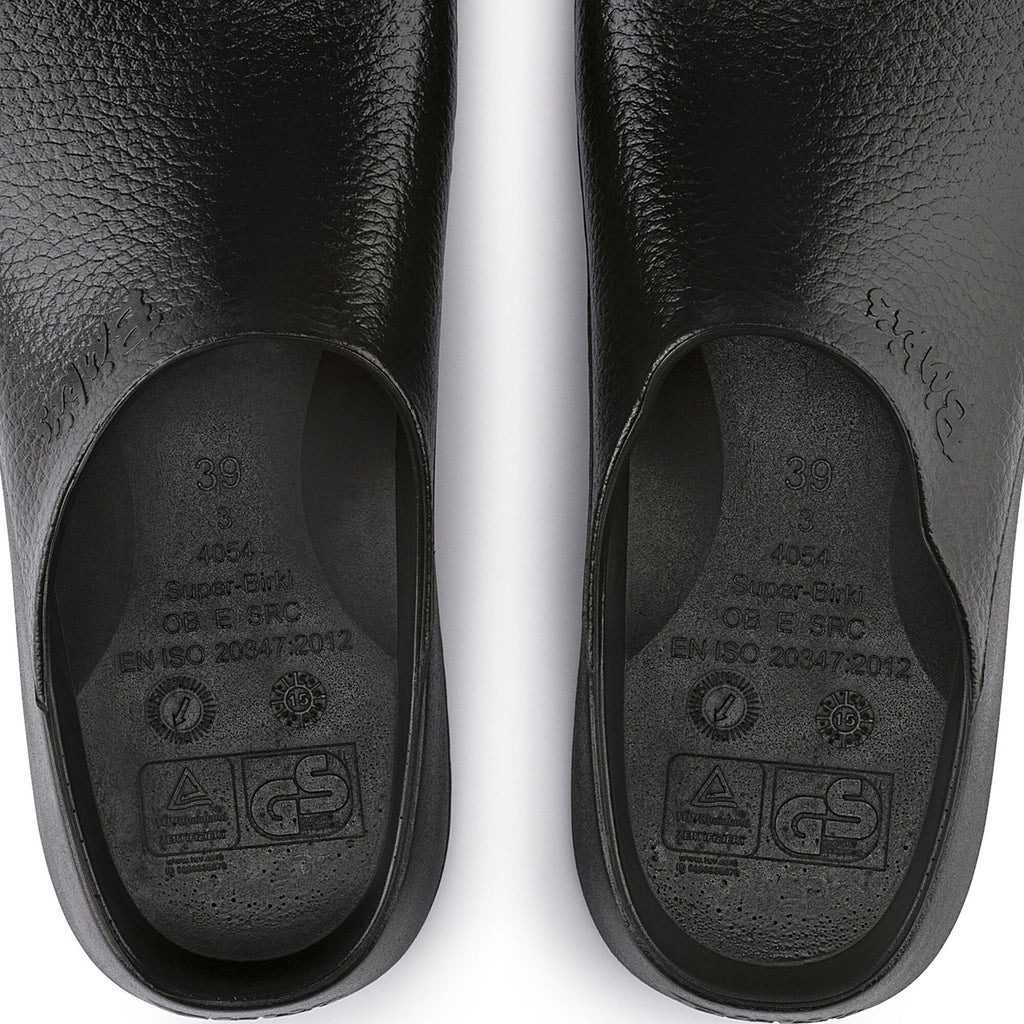 Bottom sole view of a pair of Super Birki clogs showing size 39 and safety certifications