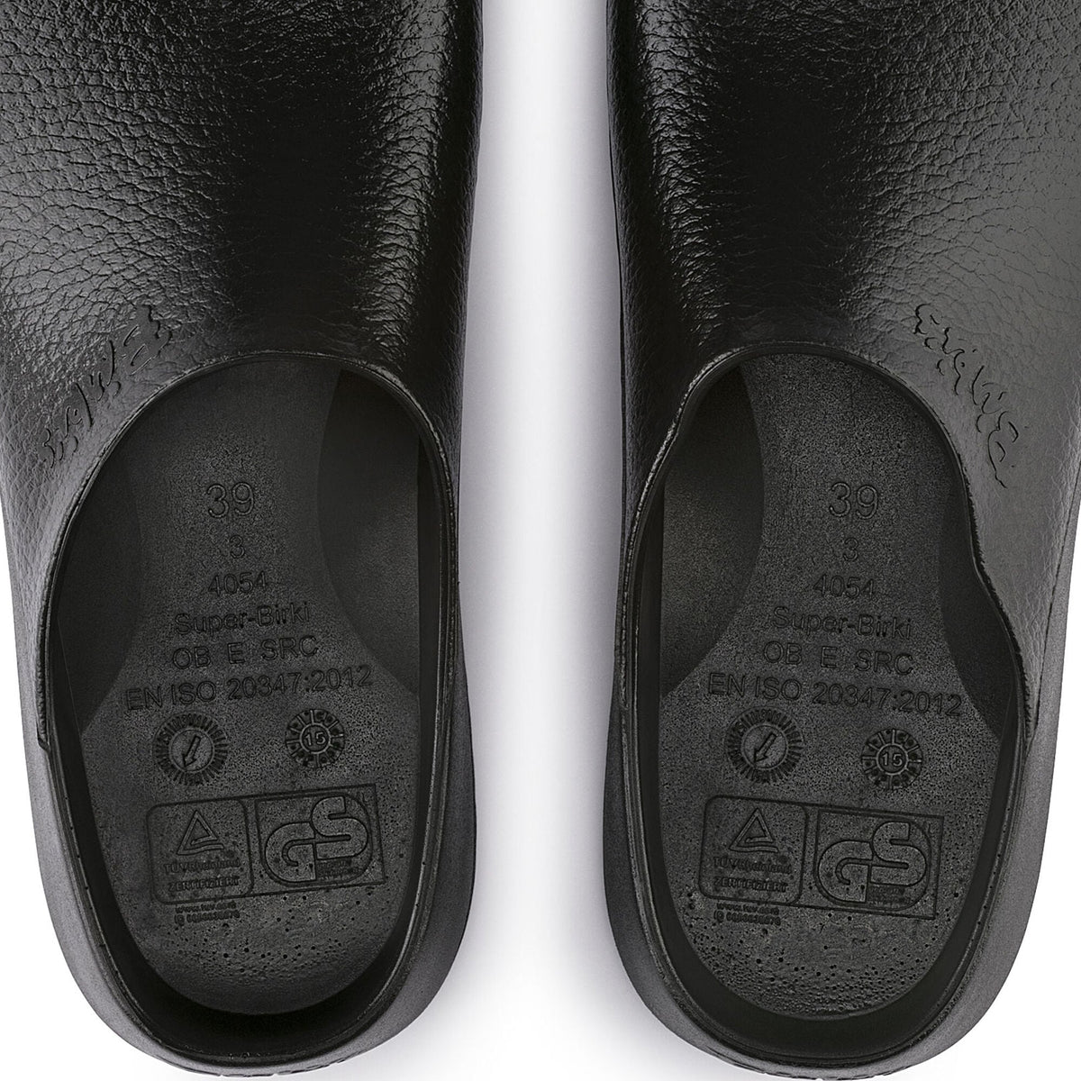 Bottom sole view of a pair of Super Birki clogs showing size 39 and safety certifications