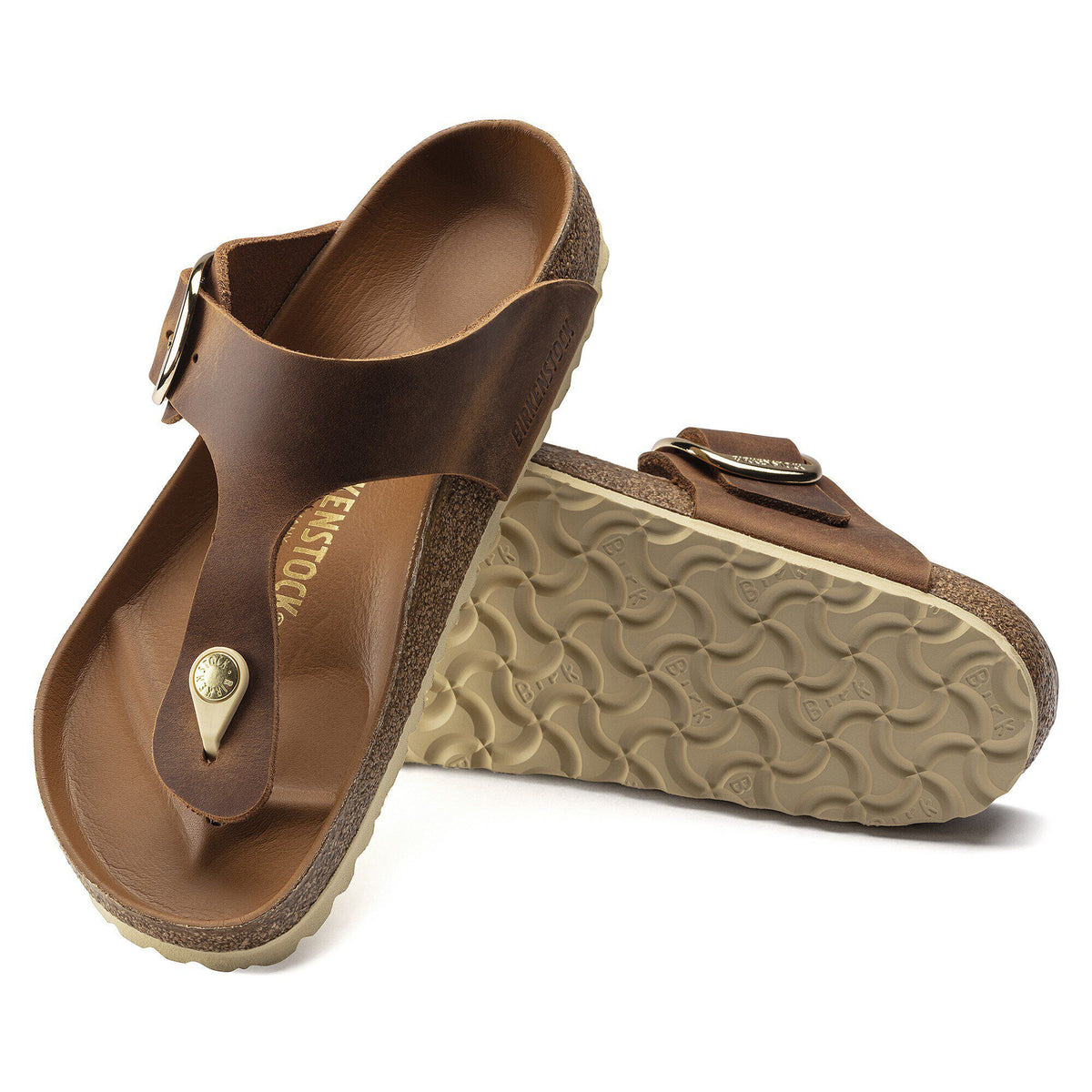 Birkenstock Gizeh thong sandal with large buckle and textured cork footbed, shown top and sole views