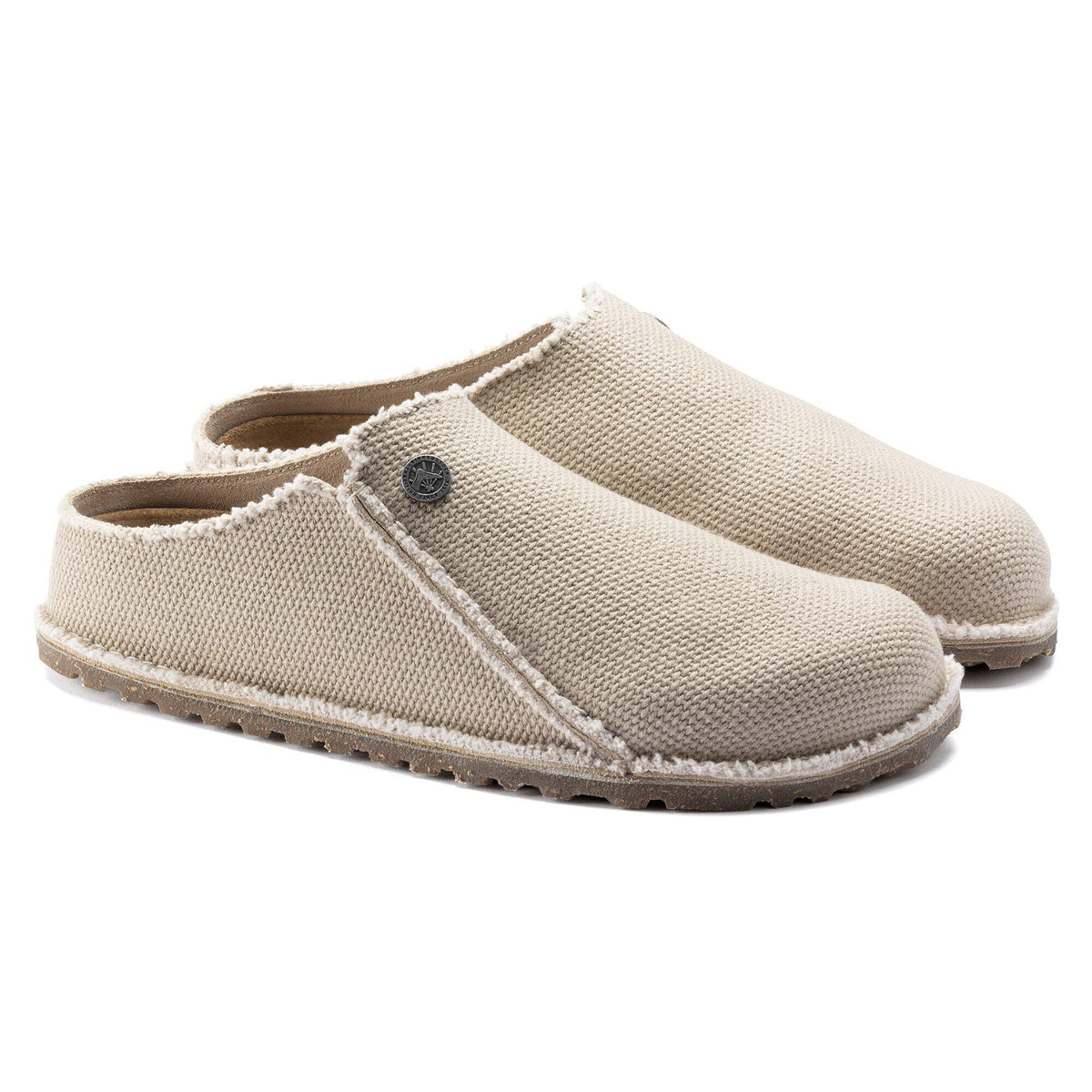 Birkenstock Zermatt slip-on clogs with textured canvas upper and sherpa lining, pair angled view
