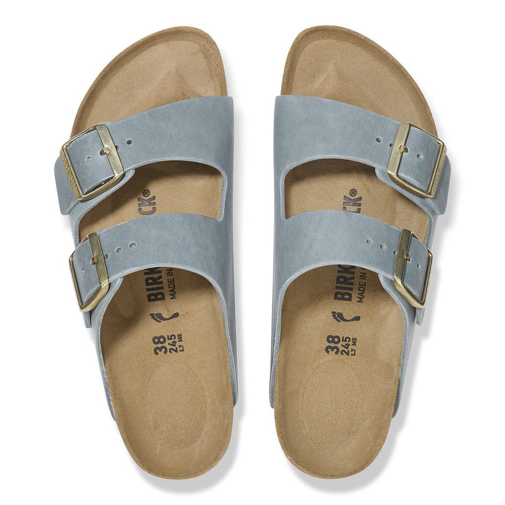 Birkenstock Arizona sandals with two adjustable gold buckle straps, top-down view