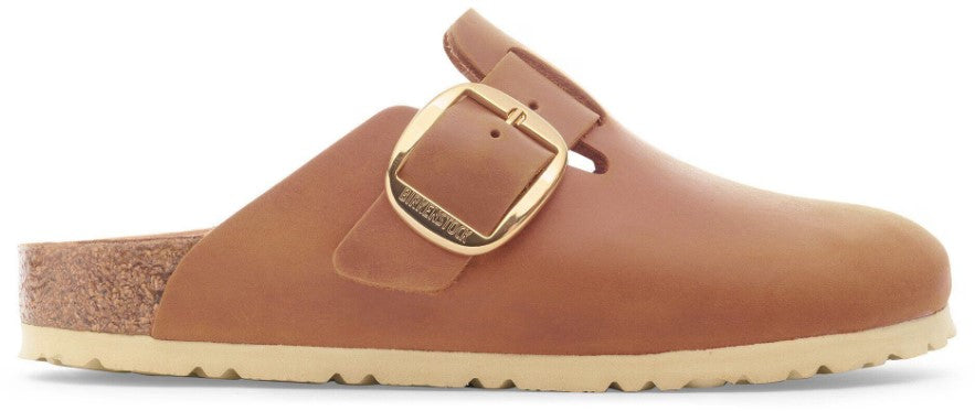 Birkenstock Boston Big Buckle clog mule with large gold buckle and cork footbed, side view