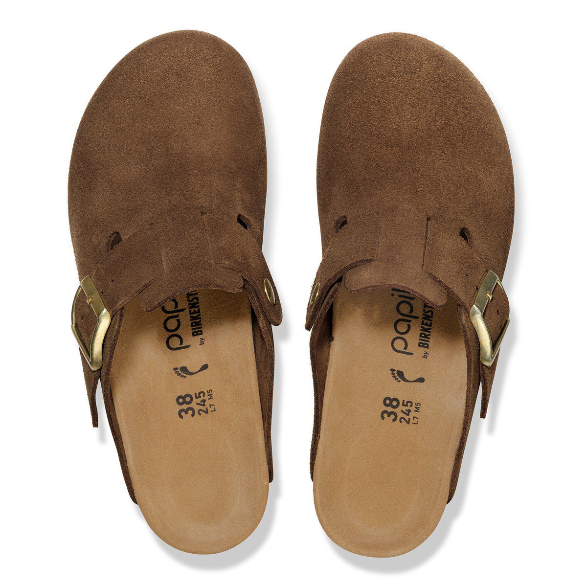 Top-down view of a pair of brown suede clogs with gold buckle straps and cork footbeds