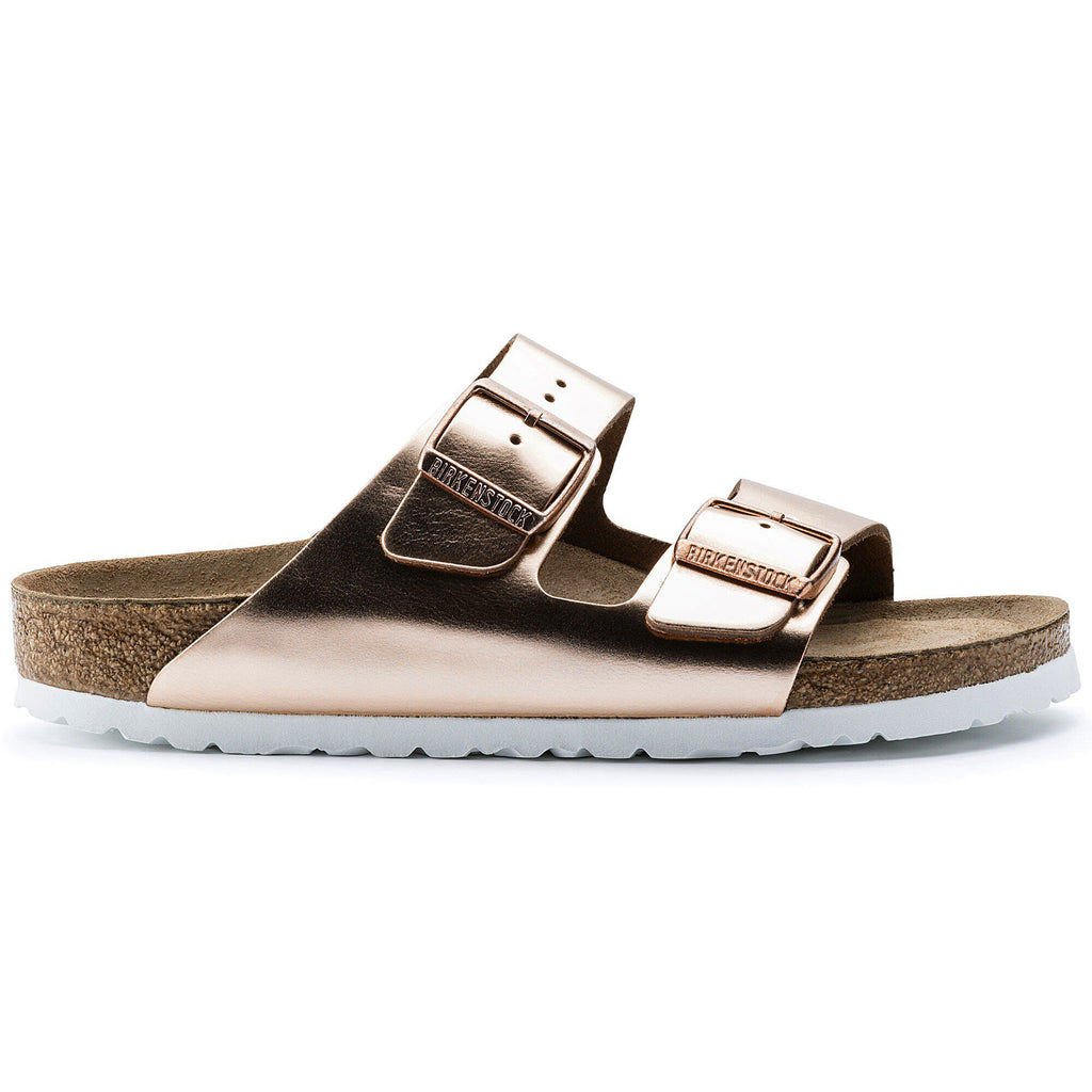 Birkenstock Arizona two-strap sandal with metallic buckles on cork footbed and white sole