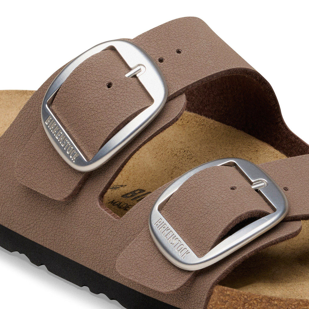 Close-up detail of Birkenstock Arizona Big Buckle sandal straps with oversized silver buckles