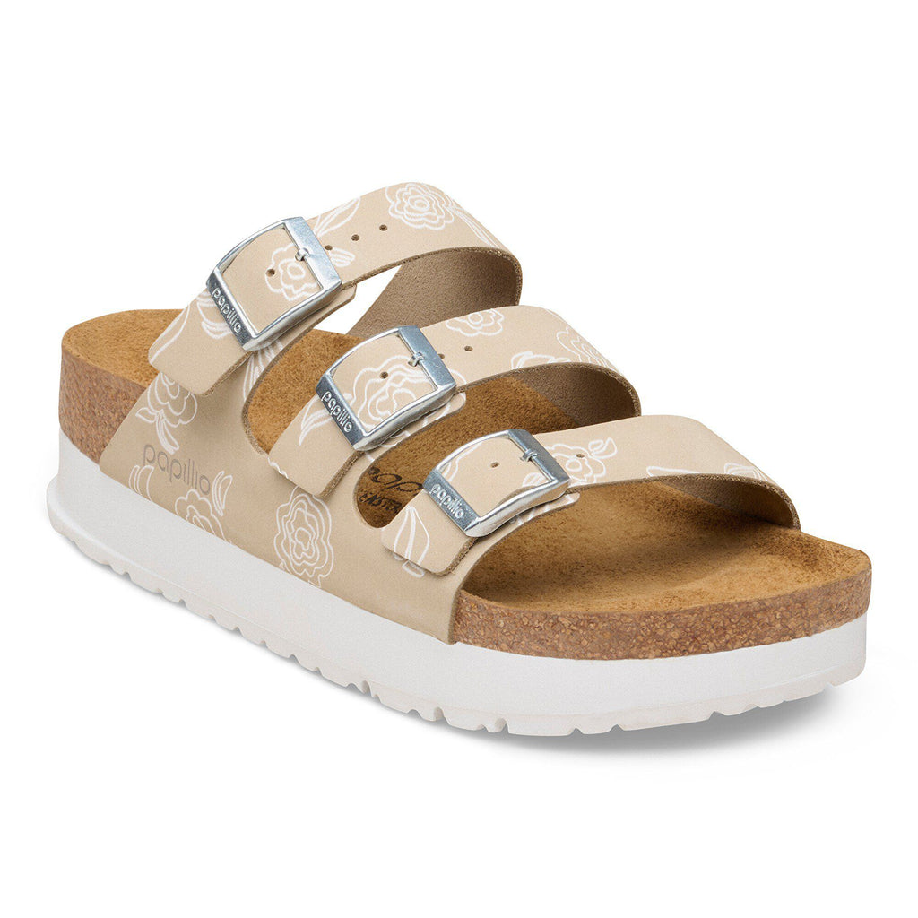 Birkenstock Papillio platform sandal with three buckle straps and floral embossed pattern