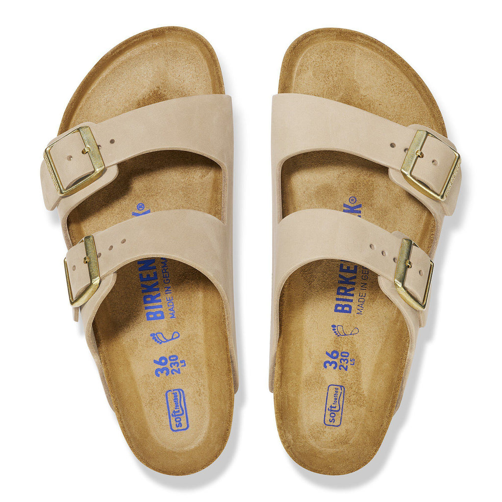 Birkenstock Arizona two-strap sandals with gold buckles, top-down view showing contoured footbed