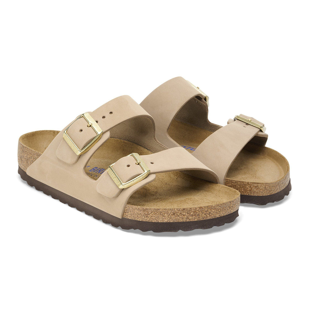 Birkenstock Arizona two-strap sandals with gold buckles and cork footbed, angled pair view