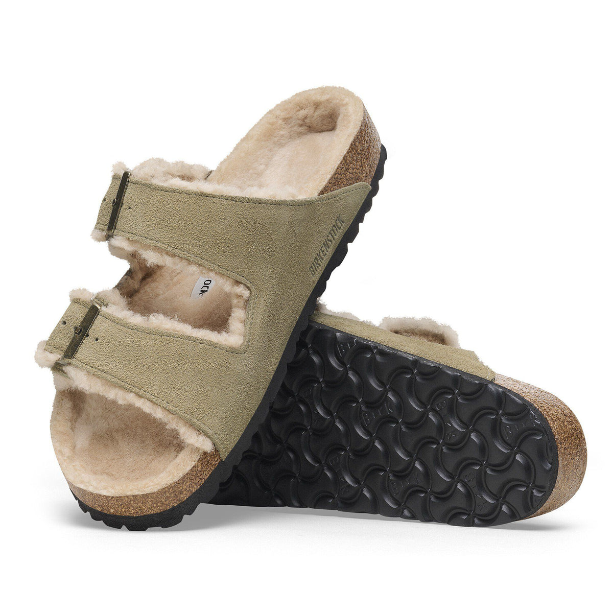 Birkenstock Arizona Shearling Flex suede sandals with shearling lining shown with outsole visible