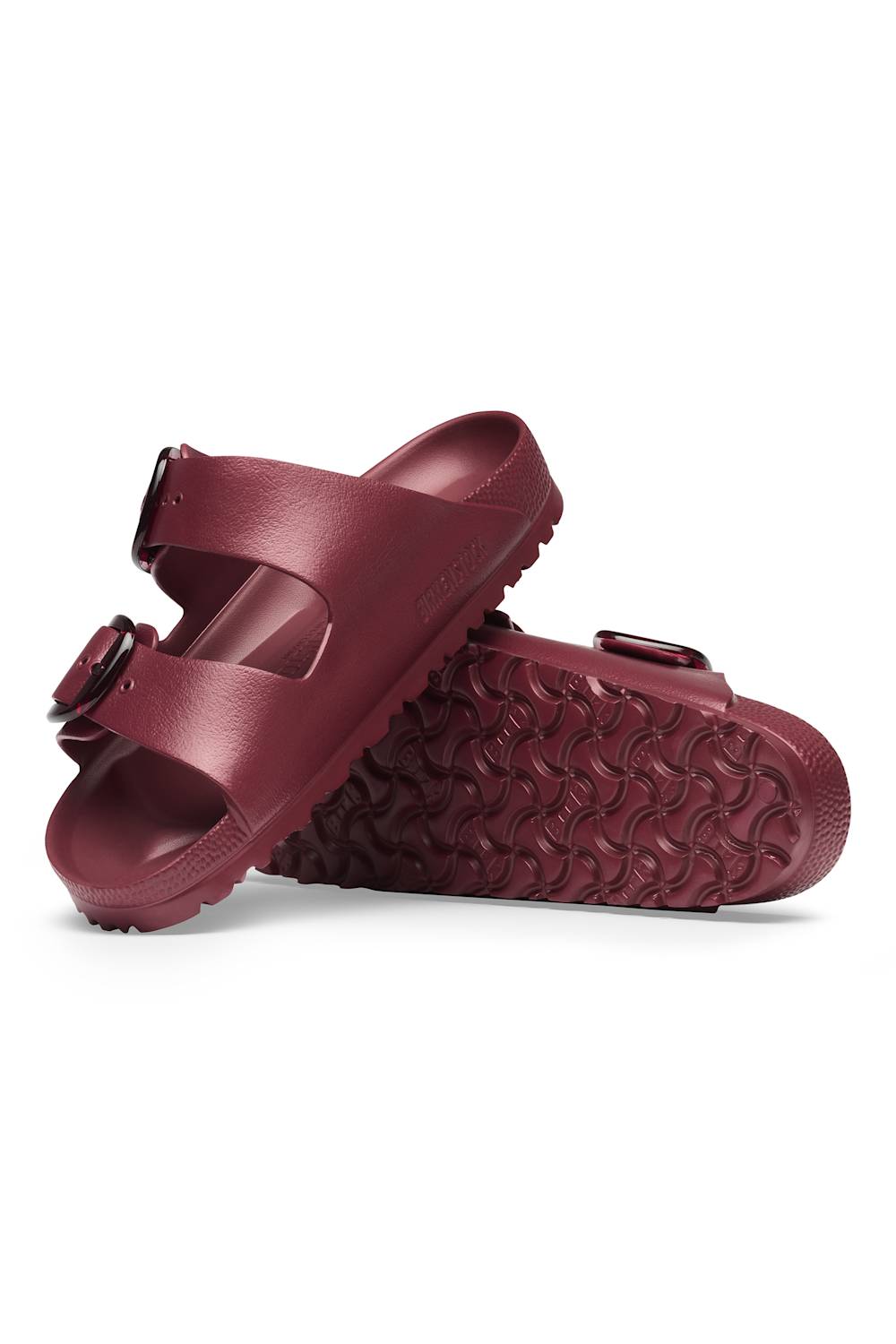 Birkenstock Arizona EVA sandals shown from side and sole angles displaying buckle straps