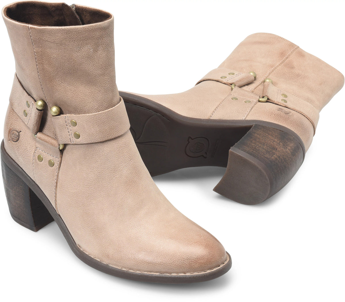 Born womens ankle boot with harness strap, brass studs, and stacked block heel, shown in pair