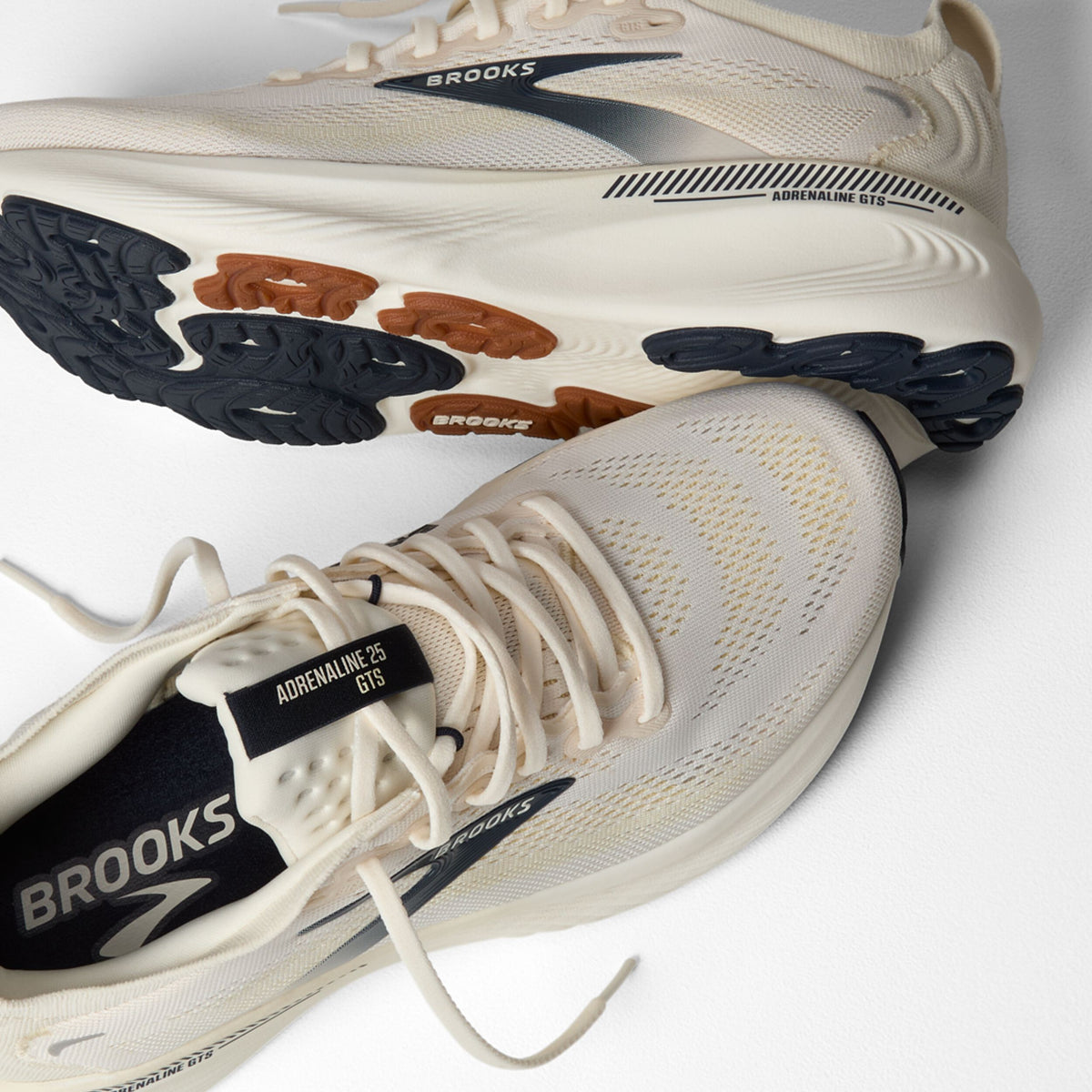 Brooks Adrenaline GTS 25 running shoes shown from top and sole angles on white background