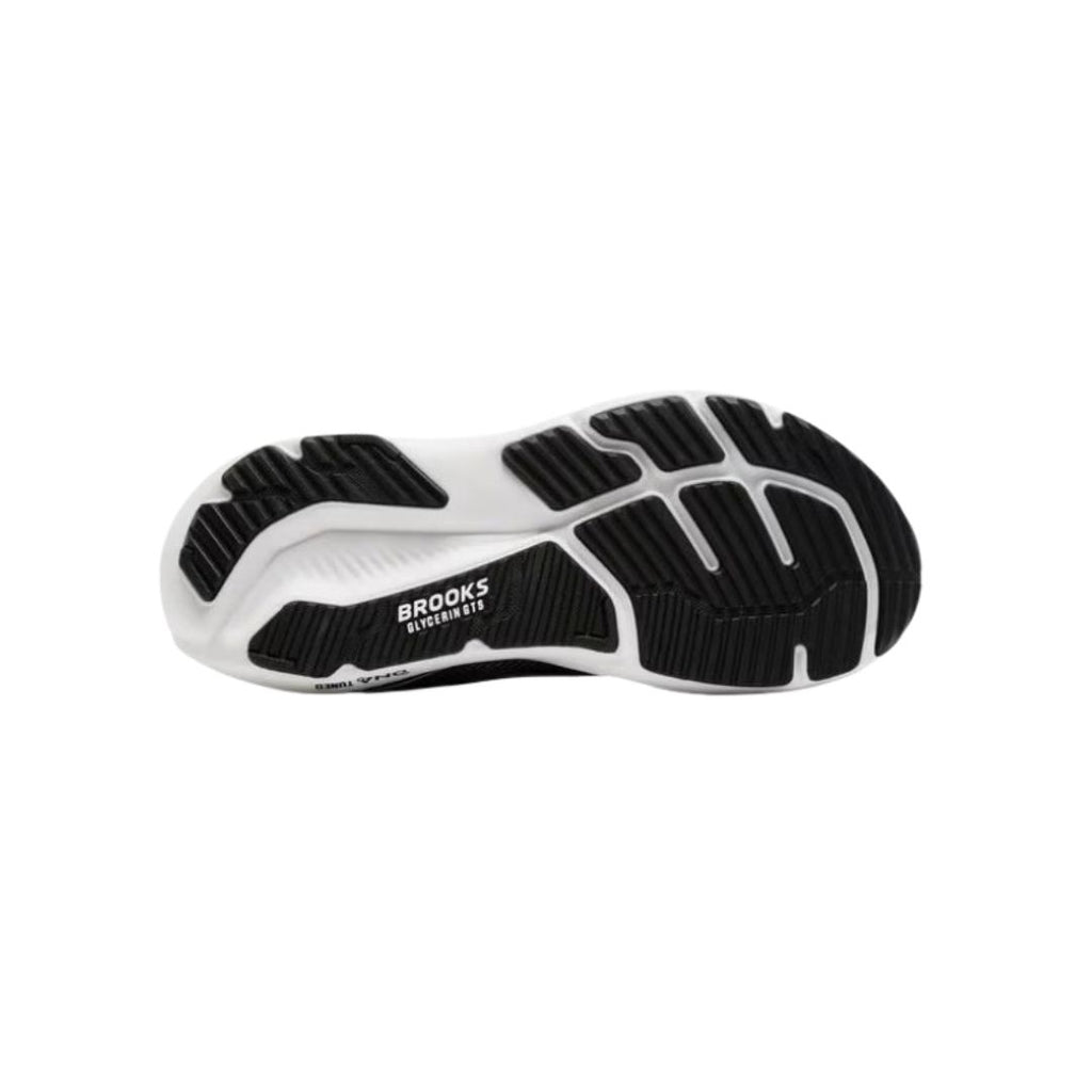 Bottom sole view of Brooks Glycerin GTS running shoe showing segmented rubber tread pattern