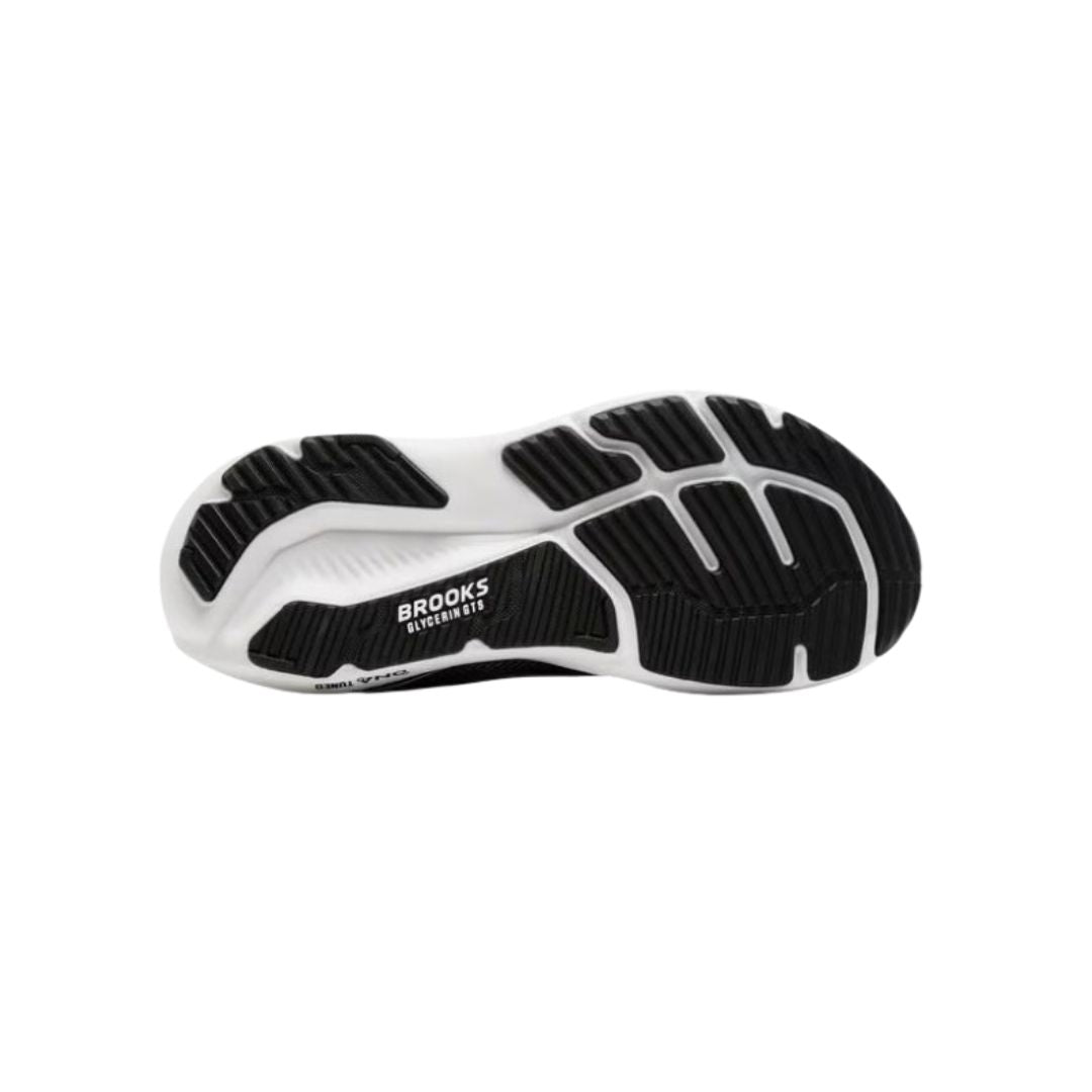 Bottom sole view of Brooks Glycerin GTS running shoe showing segmented rubber tread pattern