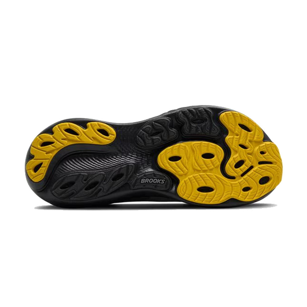 Bottom sole view of Brooks Adrenaline GTS 25 running shoe showing black and yellow outsole pattern