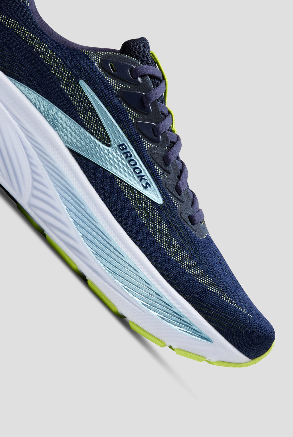 Close-up detail of Brooks Ghost 17 men's running shoe showing knit upper and midsole
